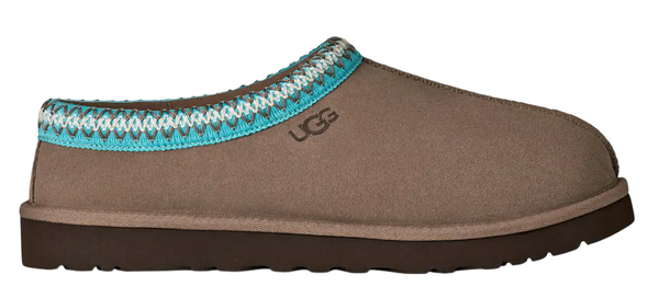 Brown slipper with blue and white patterned trim on a white background