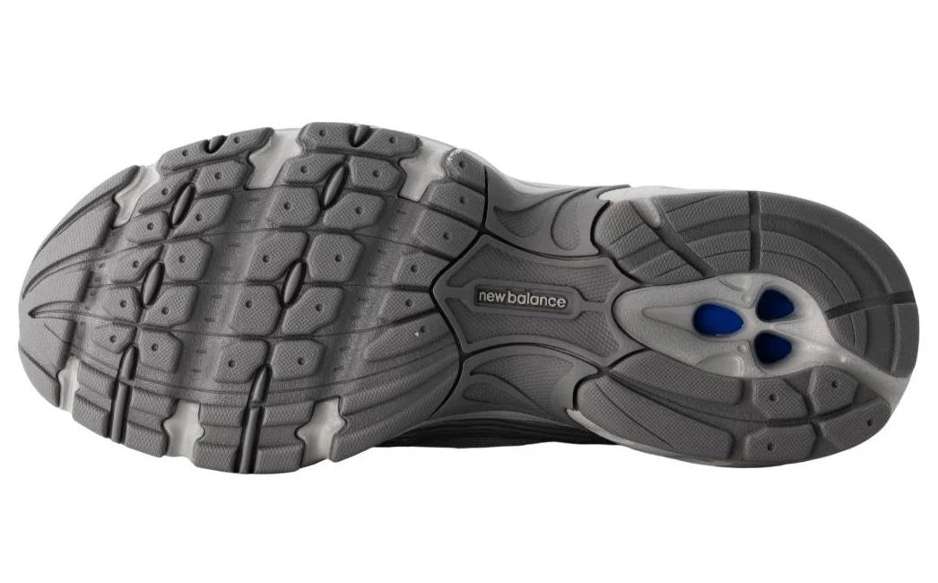 Gray athletic shoe sole with New Balance branding on a white background