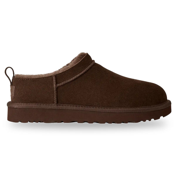Brown slip-on shoe with fuzzy lining on a white background