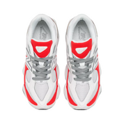 White sneakers with red accents on a white background