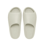Pair of light gray slippers on a white background - Image 2