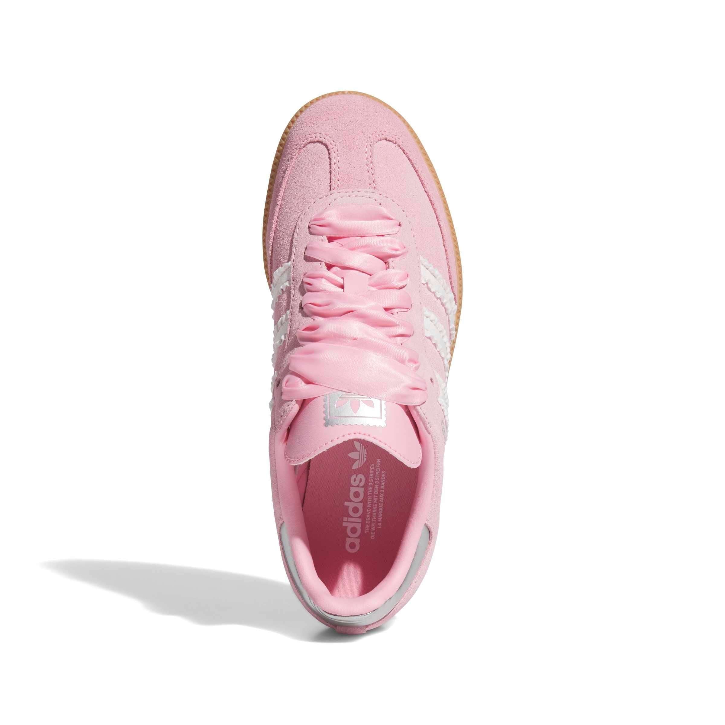 Pink Adidas sneaker on a white background