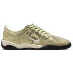 Beige sneaker with brown sole on a white background - Image 1