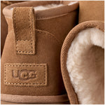UGG Classic Ultra Mini Platform Boot Chestnut (Women's) — close-up detail, UGG logo label and sheepskin lining - Image 5